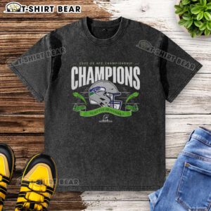 Alt Text: Funny Seattle Seahawks 2025-2026 NFC Championship Champions washed t-shirt design featuring team colors and logo.