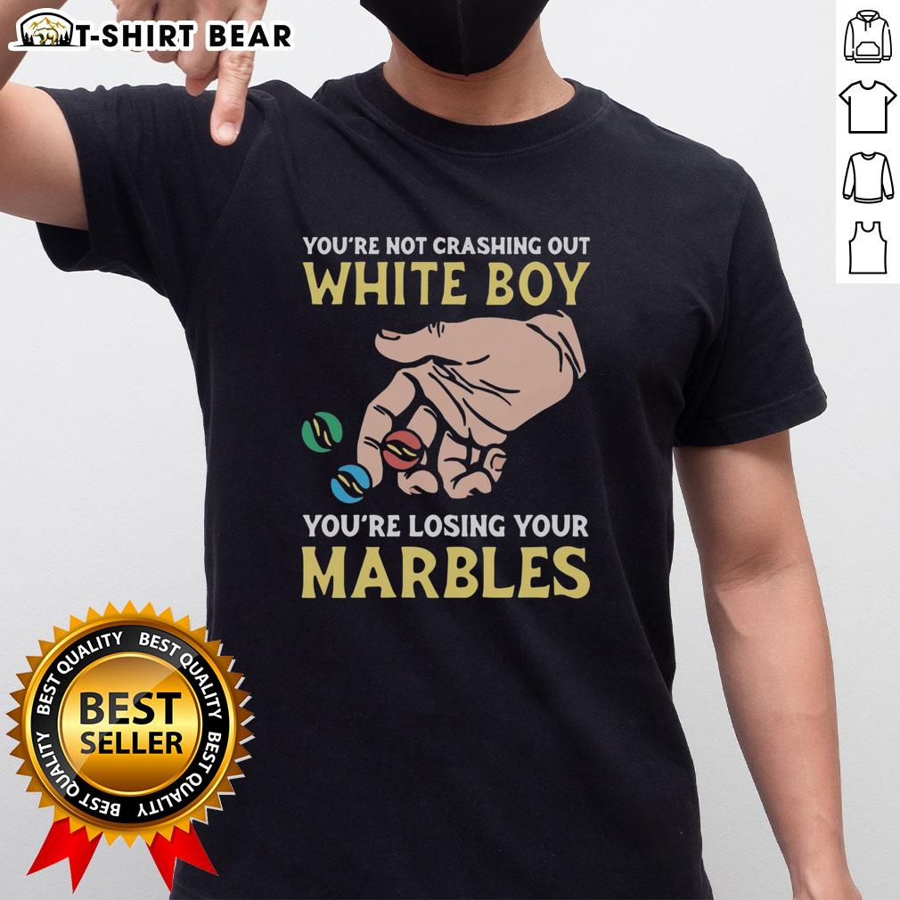 Funny 'You're Not Crashing Out, You're Losing Your Marbles' T-Shirt featuring playful graphics and bold text design.