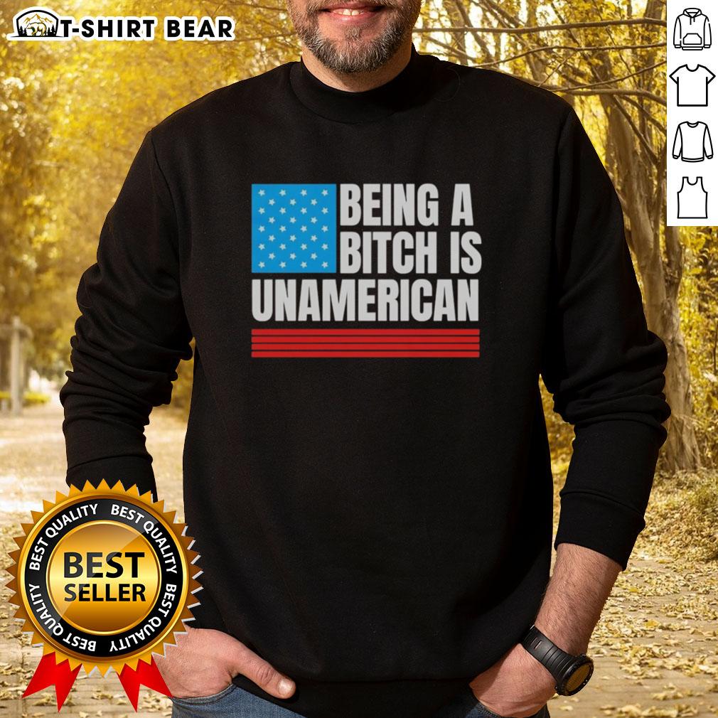 Alt Text: USA flag sweatshirt with the phrase 'Good Being a Bitch is Unamerican' promoting bold self-expression and patriotism.
