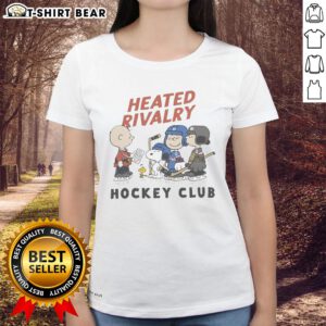 Good Peanuts Heated Rivalry Hockey Club graphic on a ladies tee, showcasing a fun and sporty design.