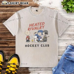Alt Text: Good Peanuts Heated Rivalry Hockey Club graphic washed t-shirt featuring a bold design and comfortable fit.