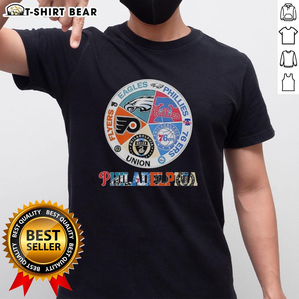 Good Philadelphia Teams T-Shirt featuring Flyers, Eagles, Phillies, and 76ers logos in vibrant colors.