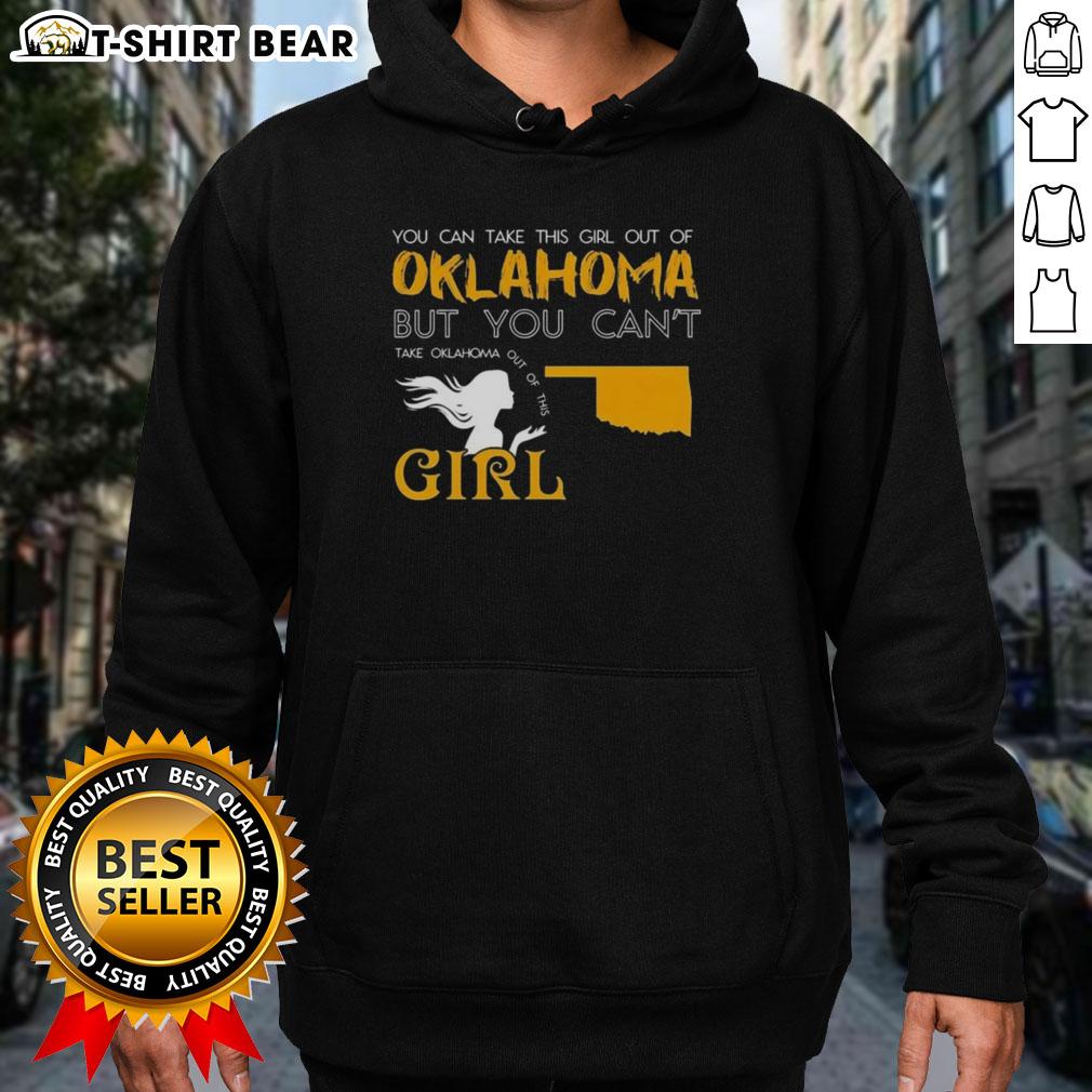Girl wearing 'Good You Can Take This Girl Out Of Oklahoma' hoodie, showcasing Oklahoma pride and stylish comfort.