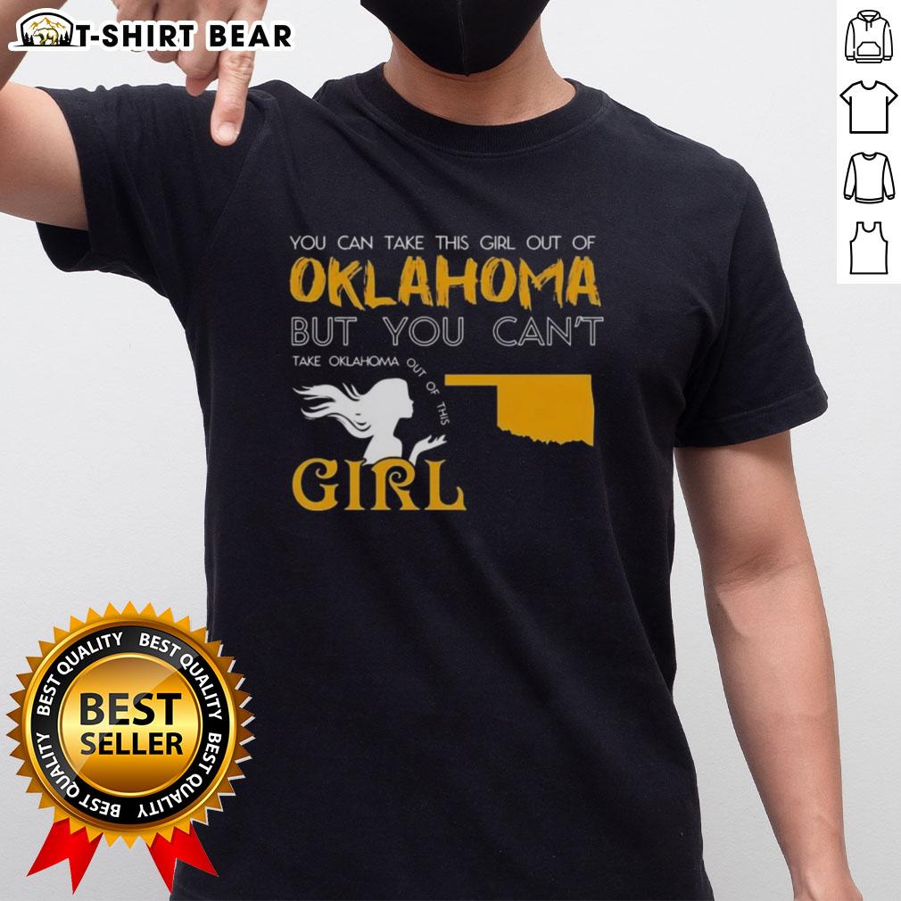 Girl wearing 'You Can Take This Girl Out Of Oklahoma' t-shirt, showcasing Oklahoma pride and style.