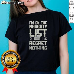 Retro ladies tee with 'Hot, I'm on the Naughty List and I Regret Nothing' slogan, perfect for festive holiday fun.