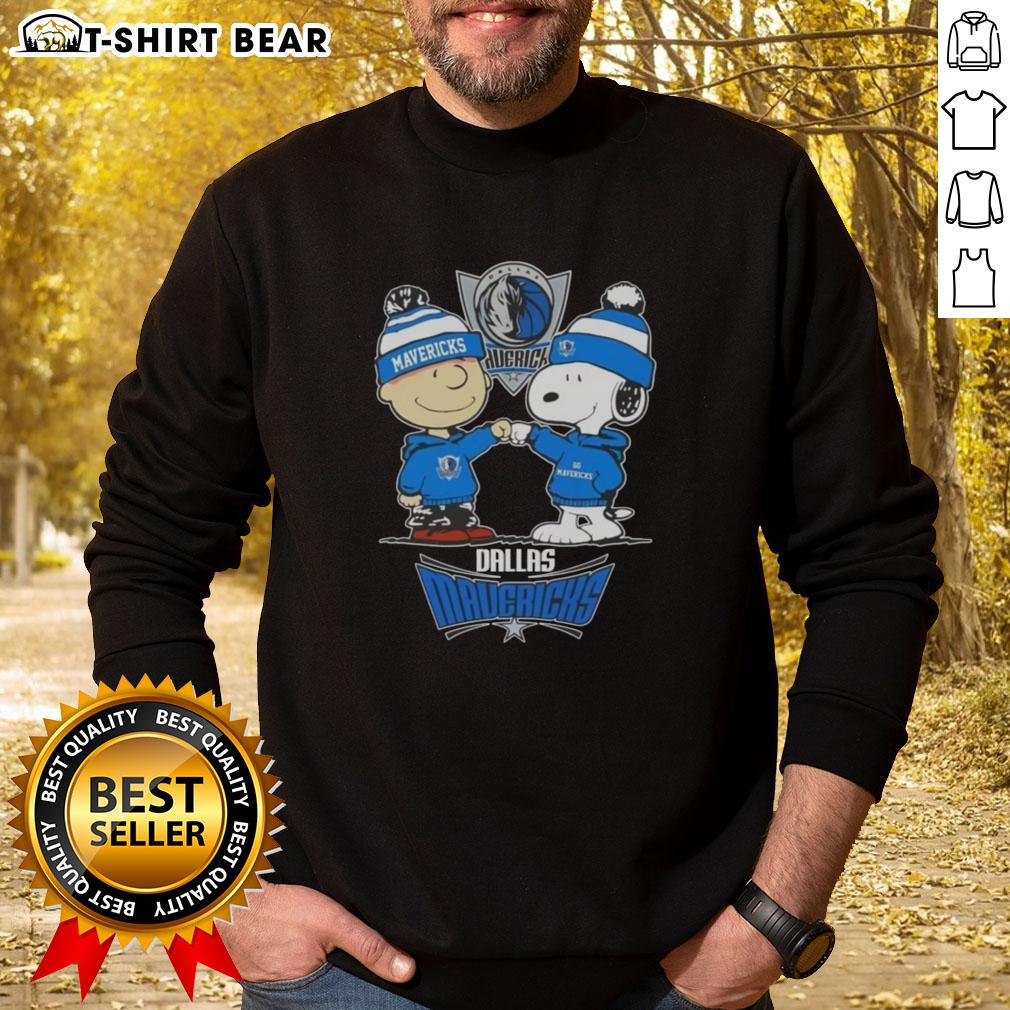 Alt Text: Snoopy gives a high five to Charlie Brown, both in Dallas Mavericks sweatshirts, celebrating team spirit.