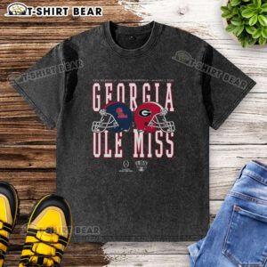 Nice Allstate Sugar Bowl 2026 Ole Miss vs Georgia helmet matchup washed t-shirt showcased on a wooden background.