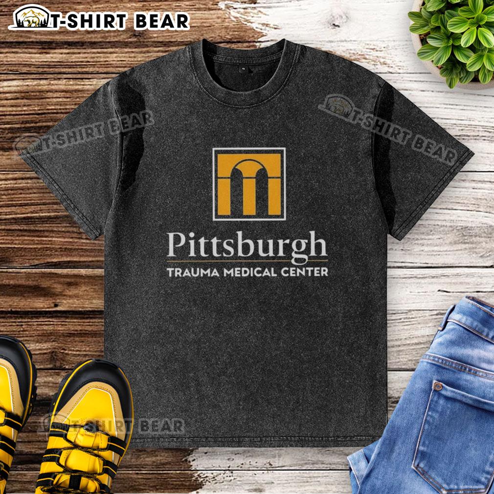 Alt Text: Nice Pittsburgh Trauma Medical Center logo on a washed t-shirt, showcasing a stylish design for medical professionals.