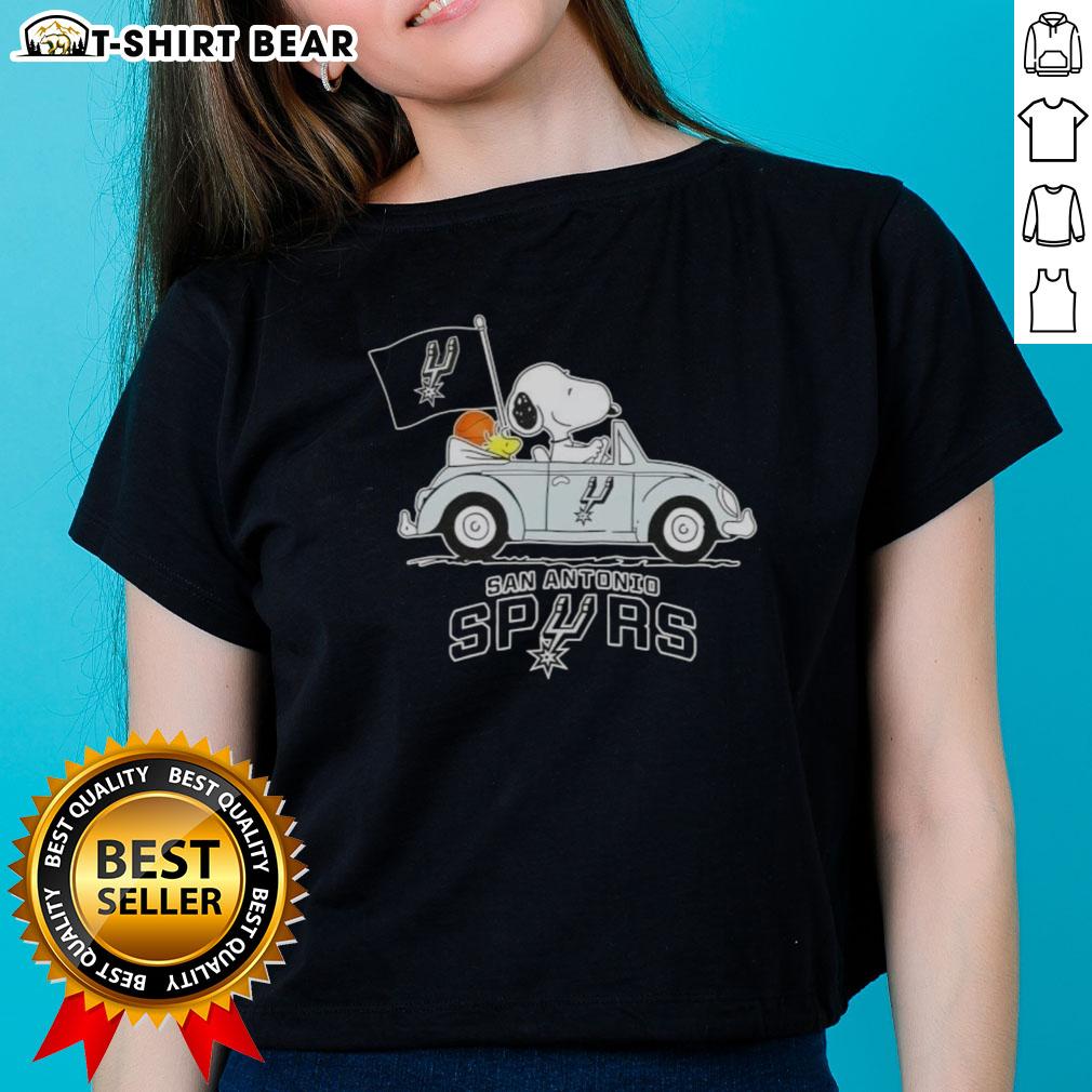 Snoopy driving a car in a San Antonio Spurs basketball-themed ladies tee design, perfect for sports fans.