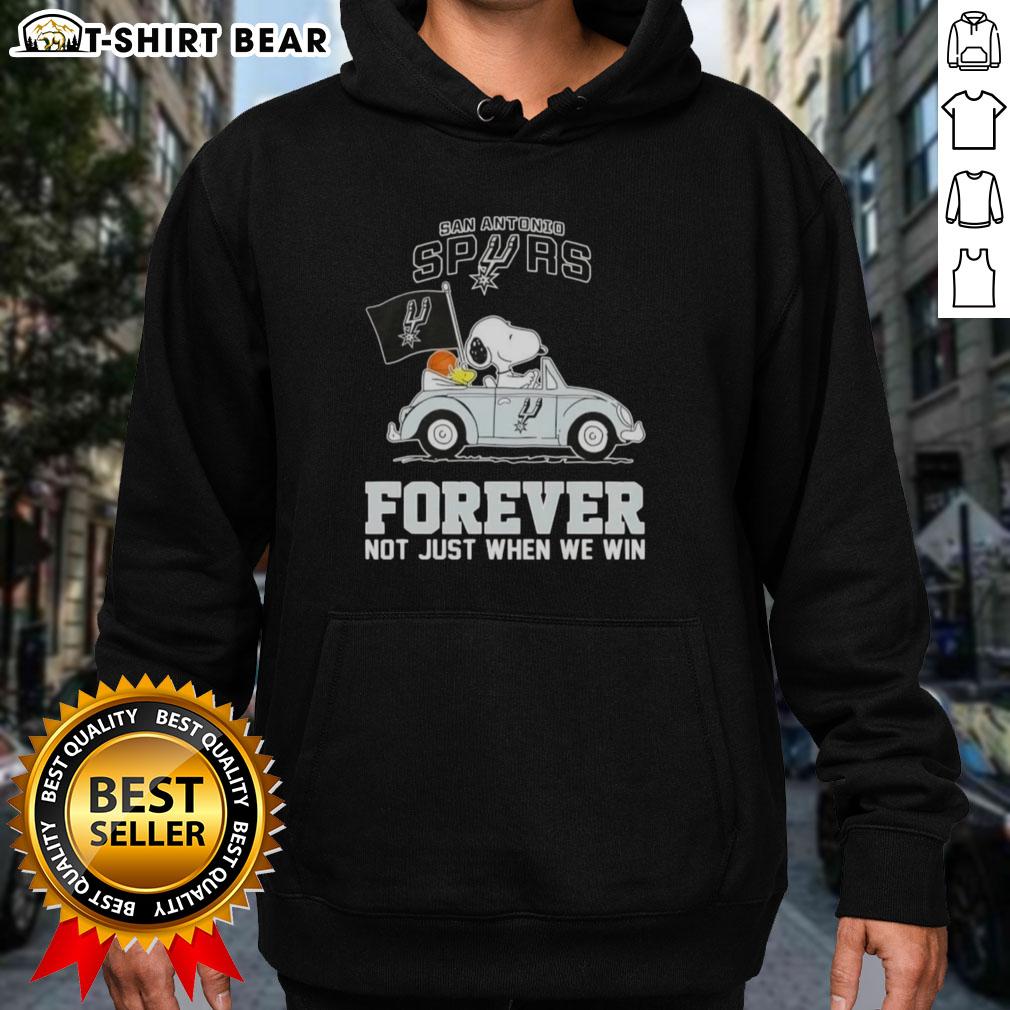Alt Text: Snoopy driving a car, wearing a San Antonio Spurs hoodie that says Forever, Not Just When We Win.
