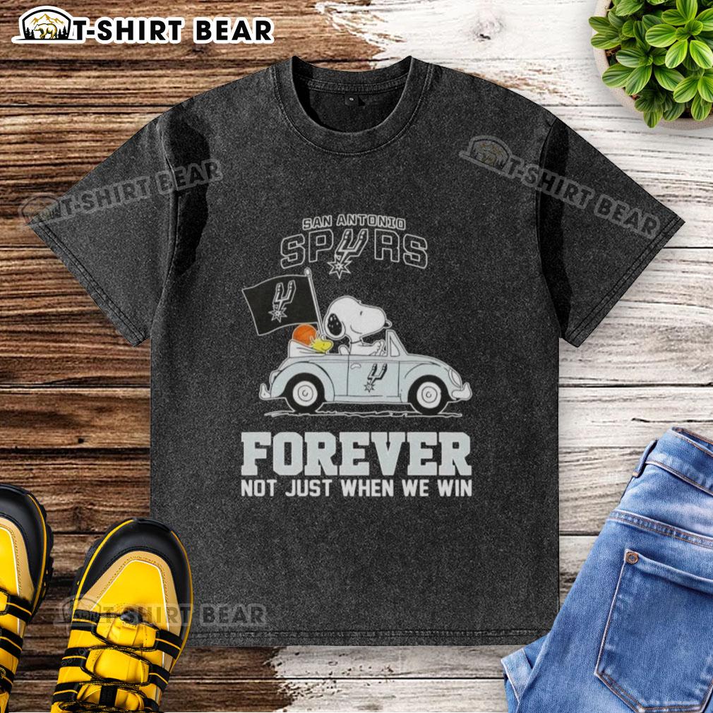 Snoopy driving a car in a San Antonio Spurs t-shirt, showcasing 'Forever, Not Just When We Win' design.