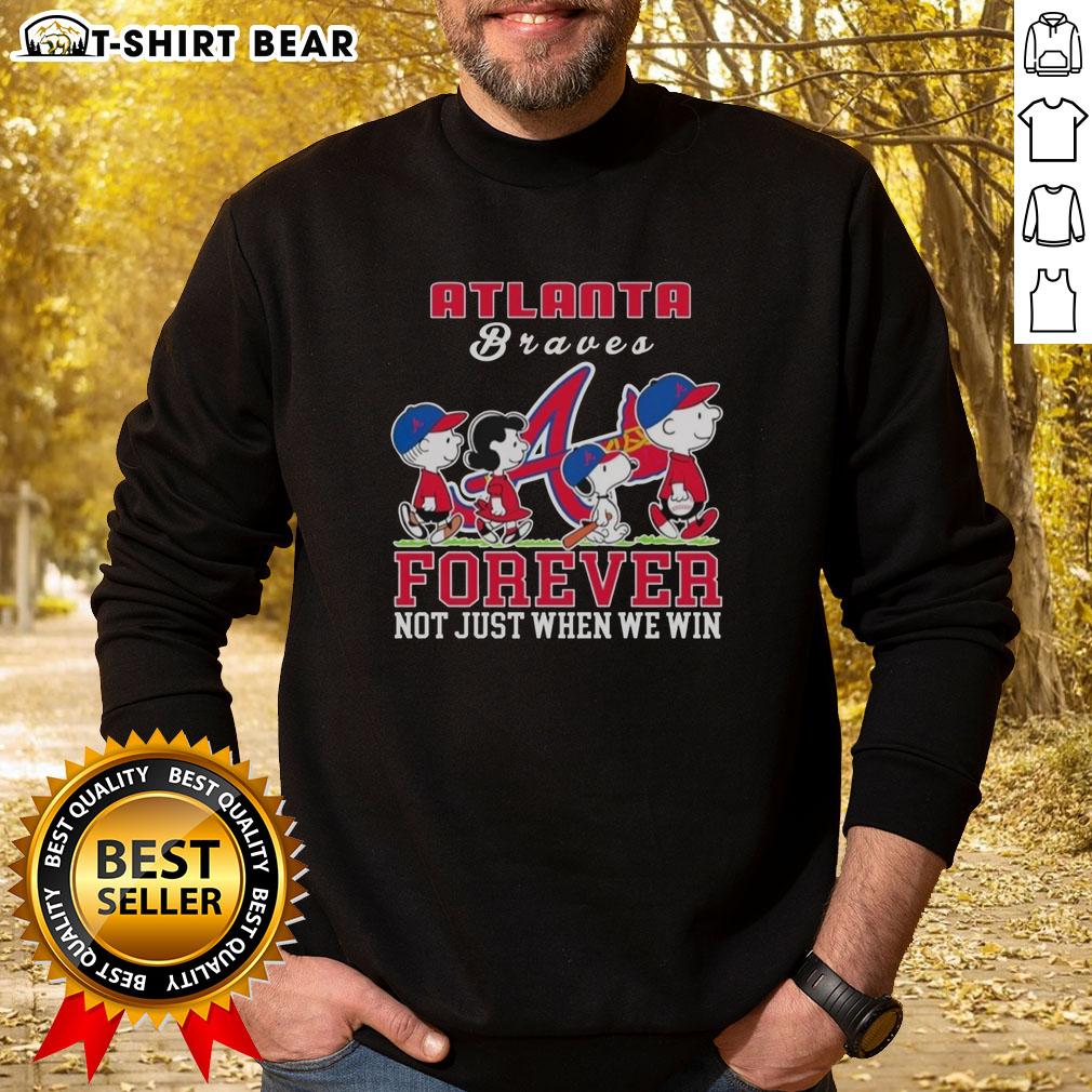 Snoopy Peanuts Atlanta Braves sweatshirt with 'Forever, Not Just When We Win' slogan, perfect for fans.