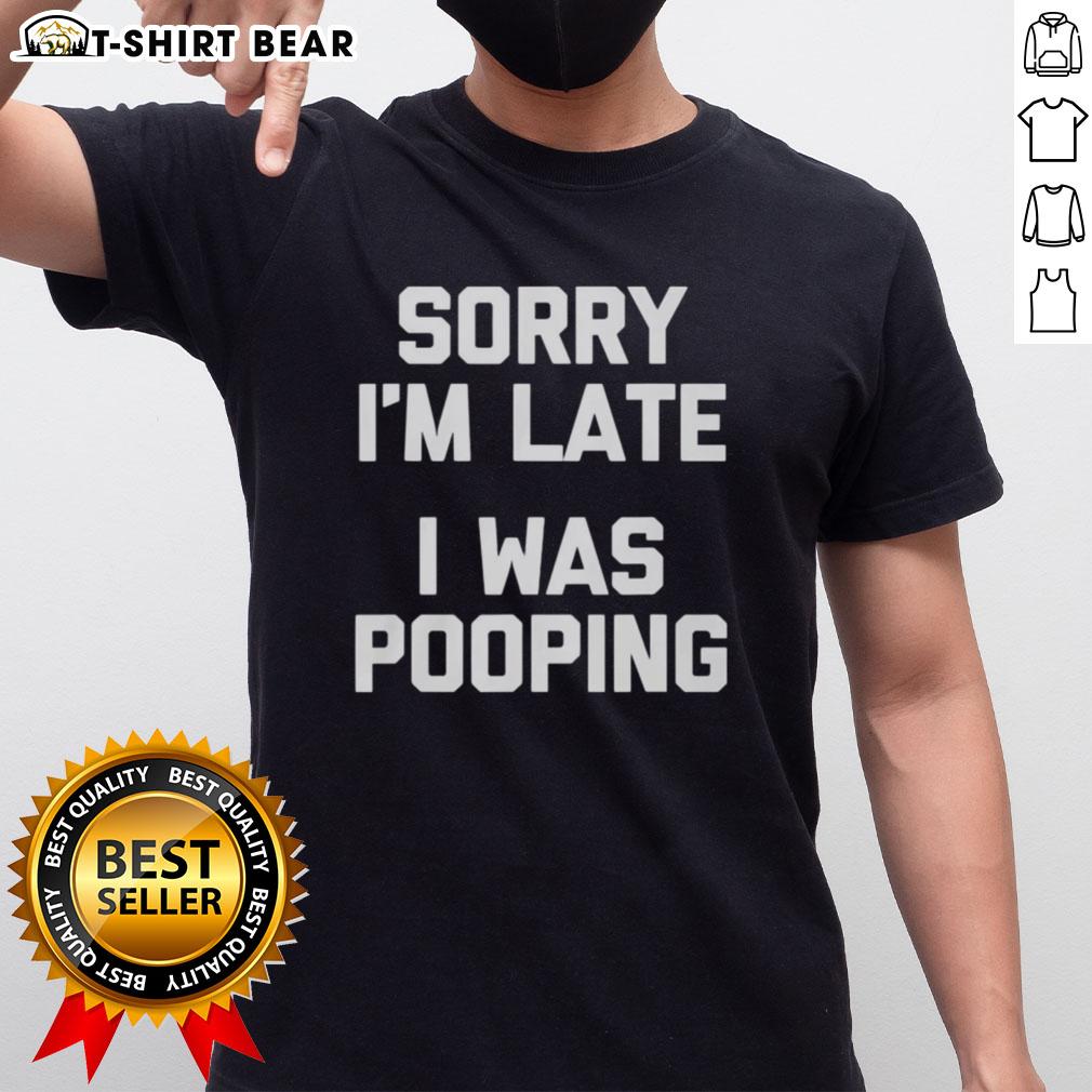 Funny 'Sorry I'm Late I Was Pooping' T-Shirt design featuring playful text on a casual shirt for humor lovers.