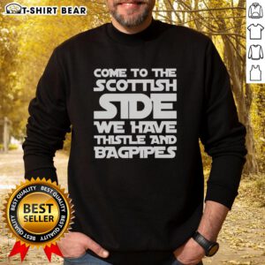Cozy sweatshirt featuring 'Star Wars' theme with thistle and bagpipes, perfect for Scottish fans and sci-fi lovers.