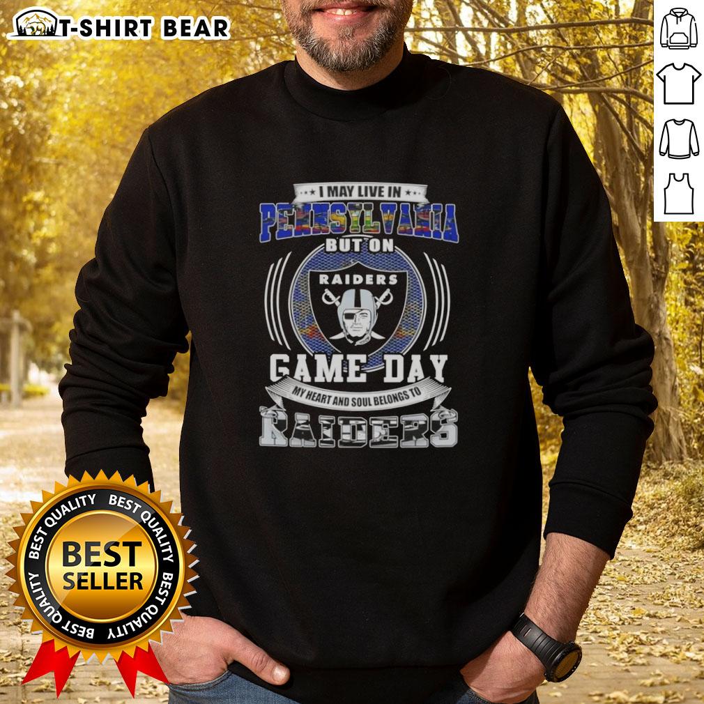 Cozy sweatshirt with 'I May Live In Pennsylvania But On Game Day My Heart Belongs To Las Vegas Raiders' slogan.