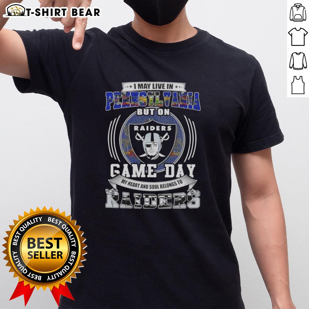 Alt Text: Official I May Live In Pennsylvania But On Game Day My Heart And Soul Belongs To Las Vegas Raiders T-Shirt design.