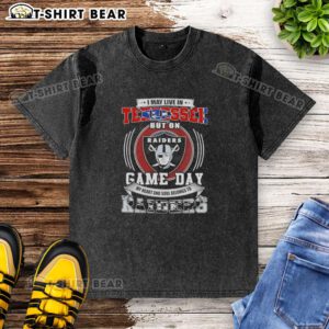 Las Vegas Raiders washed t-shirt with 'I may live in Tennessee' slogan, perfect for game day fans and supporters.