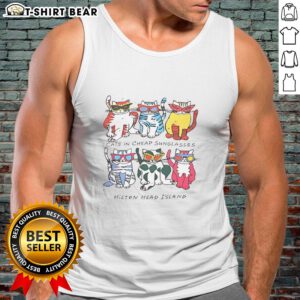 Justin wearing cheap sunglasses and a Hilton Head Island cats graphic tank top, smiling on a sunny day.