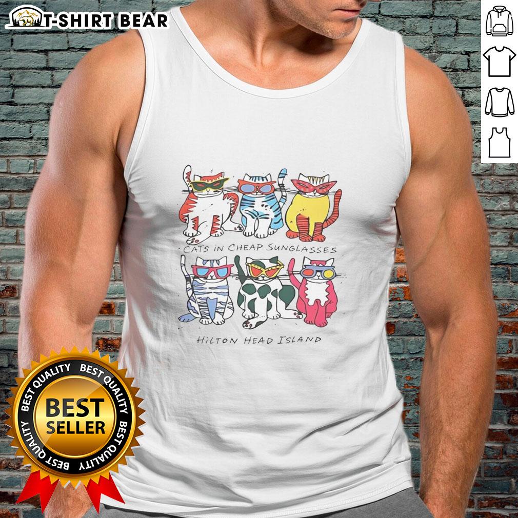 Justin wearing cheap sunglasses and a Hilton Head Island cats graphic tank top, smiling on a sunny day.