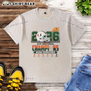 Official Miami Hurricanes CFP National Champions 2026 washed t-shirt featuring team logo and vibrant colors.