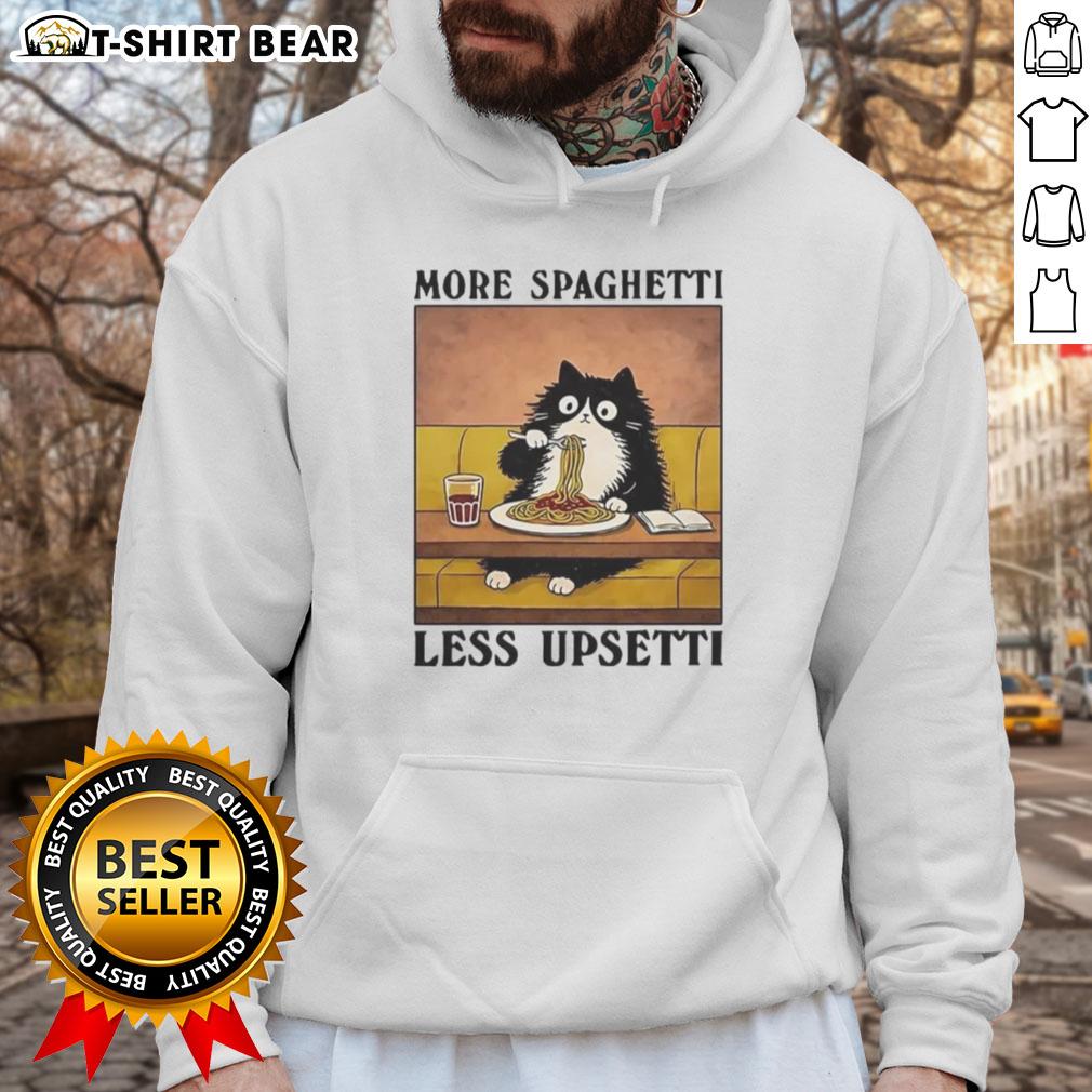 Black cat enjoying Italian food while wearing an Official More Spaghetti Less Upsetti hoodie, perfect for cat lovers.