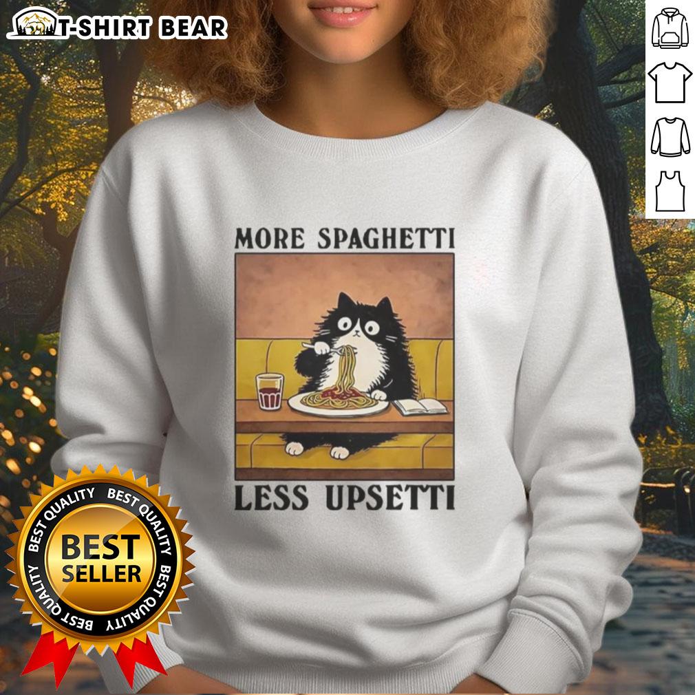 Alt Text: Black cat enjoying Italian food while wearing the More Spaghetti Less Upsetti sweatshirt, perfect for cat lovers.