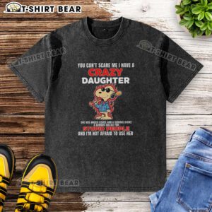 Alt Text: Official Snoopy holding a bat in flames, featuring the quote about a crazy daughter with anger issues on a washed t-shirt.