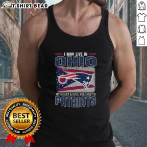 Alt Text: Woman wearing a New England Patriots flag tank top, showcasing team spirit while living in Ohio on game day.
