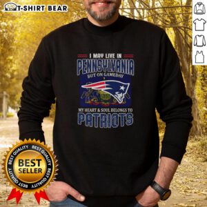 Cozy sweatshirt featuring 'I May Live In Pennsylvania But My Heart Belongs To New England Patriots' design.