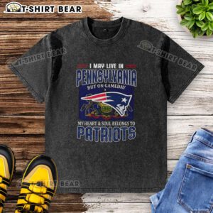 Washed t-shirt featuring 'I May Live In Pennsylvania But On Gameday My Heart Belongs To New England Patriots' slogan.