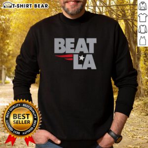 Original New England Patriots Beat La Sweatshirt featuring team logo and vibrant colors for fans and collectors.