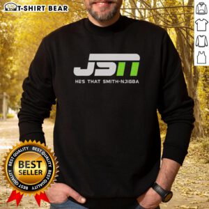 Alt Text: Jaxon Smith-Njigba wearing a Seattle Seahawks sweatshirt, showcasing his sporty style and team spirit.