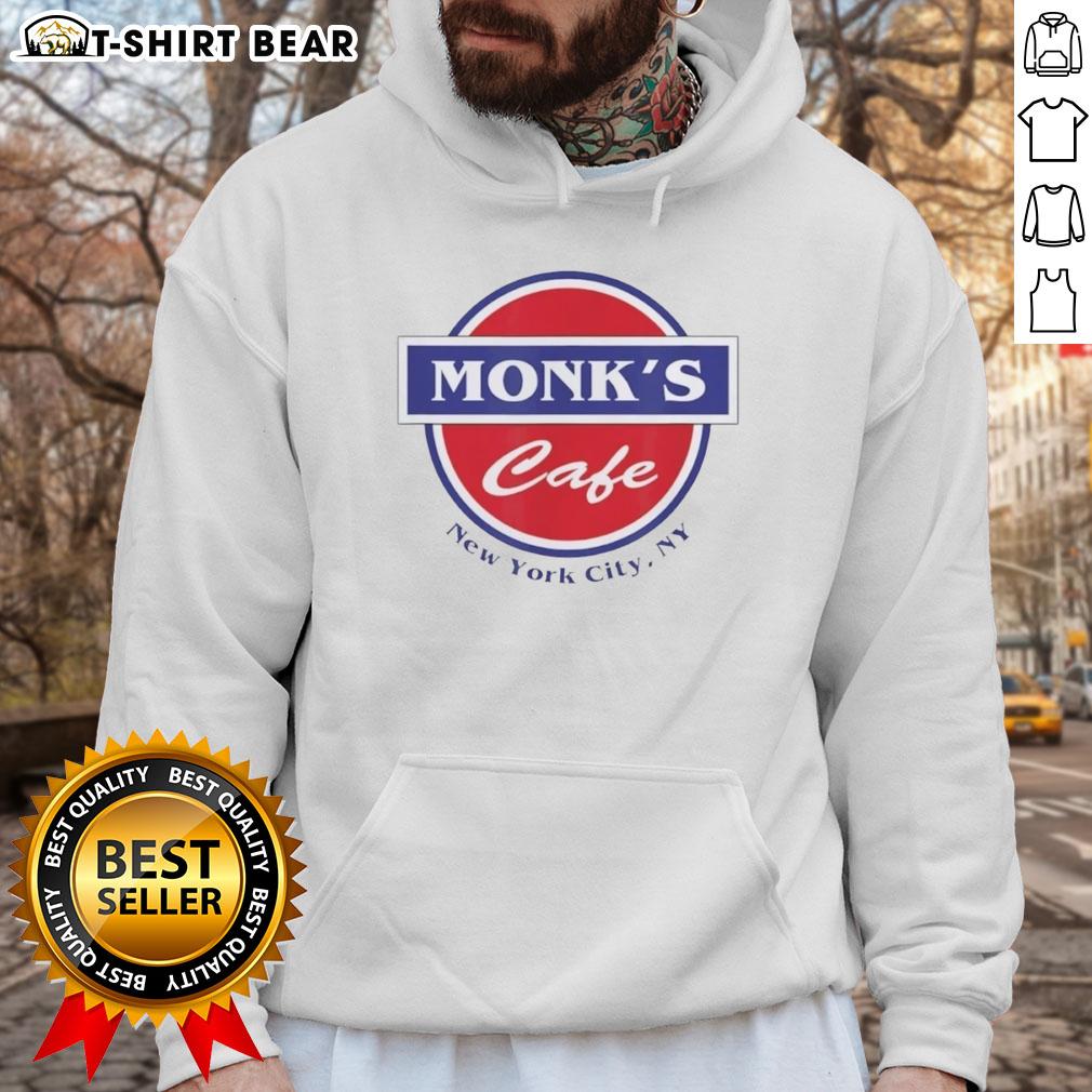 Cozy Pretty Monks Cafe in New York City, NY, featuring a stylish hoodie and inviting atmosphere.
