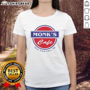 Pretty Monks Cafe in New York City: Stylish ladies tee featuring a vibrant design and cozy cafe atmosphere.