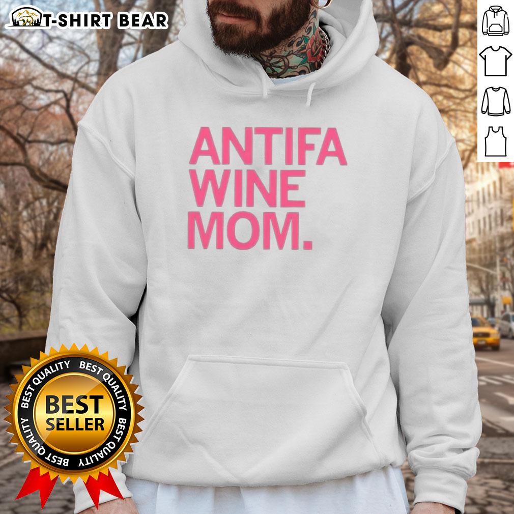 Trendy Top Antifa Wine Mom Hoodie featuring bold graphics, perfect for stylish protestors and wine enthusiasts.