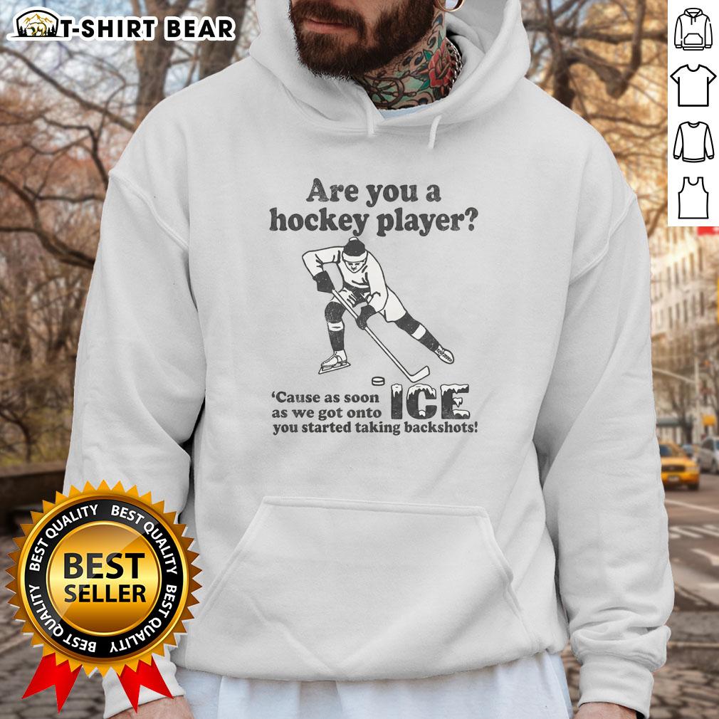 Alt Text: Hockey player wearing 'Are You A Hockey Player?' hoodie on ice, showcasing their passion for the sport.