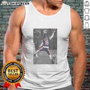 Alt Text: Caleb Williams wearing the Jumpman tank top, showcasing athletic style and comfort in a vibrant design.