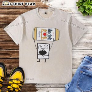 Alt Text: Doodlebob holding a Modelo Especial beer can while wearing a washed t-shirt, showcasing a fun and quirky character.