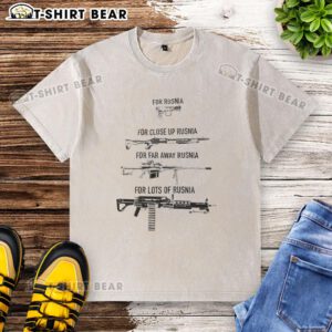 Close-up of a washed 'Top Gun for Rusnia' t-shirt, featuring vibrant graphics and a stylish design for casual wear.