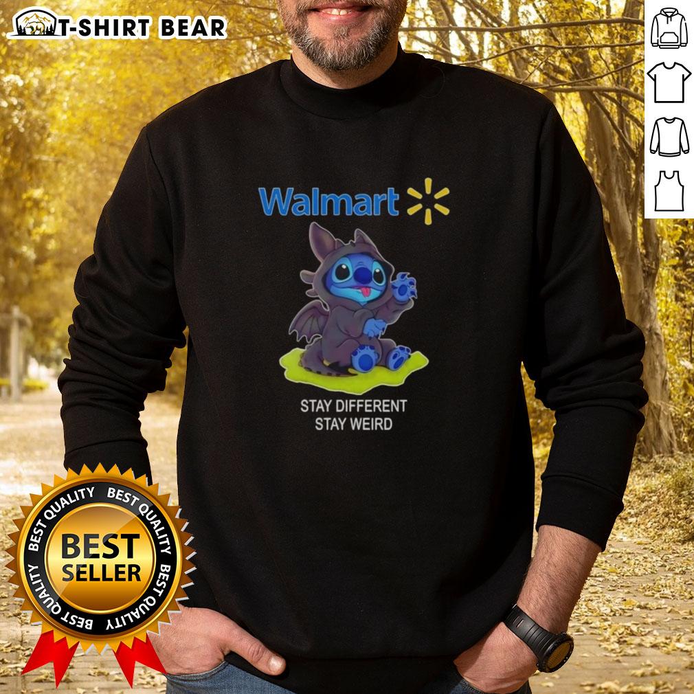 Top Stitch Cosplay Toothless X Walmart sweatshirt featuring unique design, promoting 'Stay Different, Stay Weird' message.