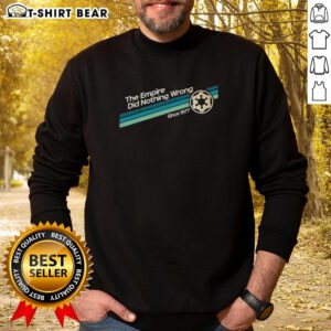 Top The Empire Did Nothing Wrong Since 1977 sweatshirt featuring bold text design on a cozy fabric background.