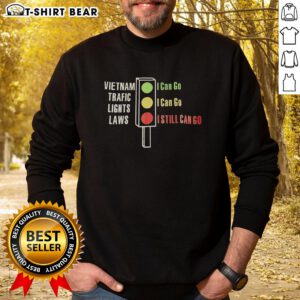 Alt Text: Top Vietnam Traffic Lights Laws sweatshirt featuring a humorous design: 'Green I Can Go, Yellow I Can Go, Red I Still Can Go.'