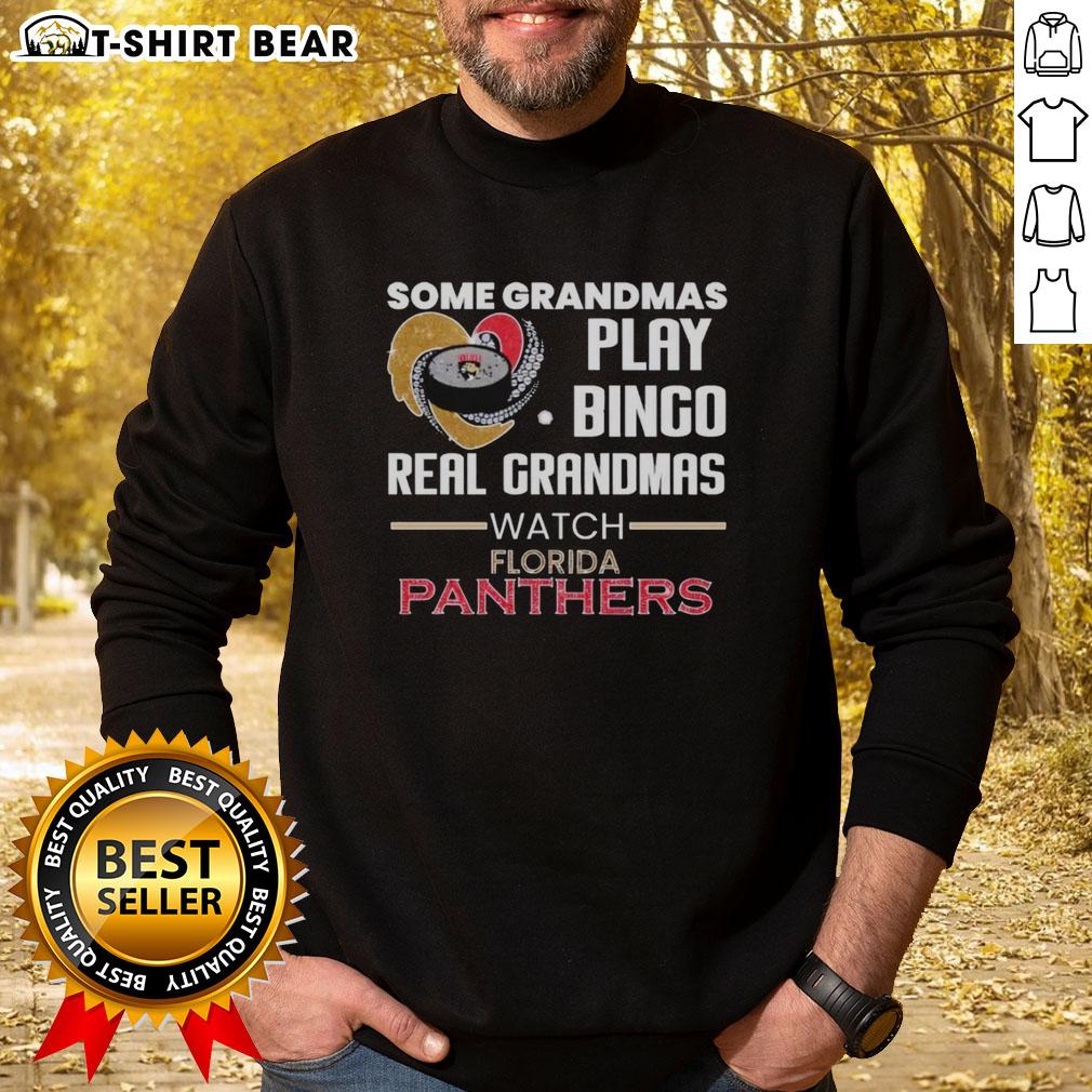 Grandmas play bingo while wearing Florida Panthers sweatshirt, showcasing fun and camaraderie in an awesome gathering.