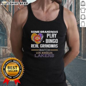Grandmas in fun tank tops play bingo while cheering for the Los Angeles Lakers, showcasing their awesome spirit.