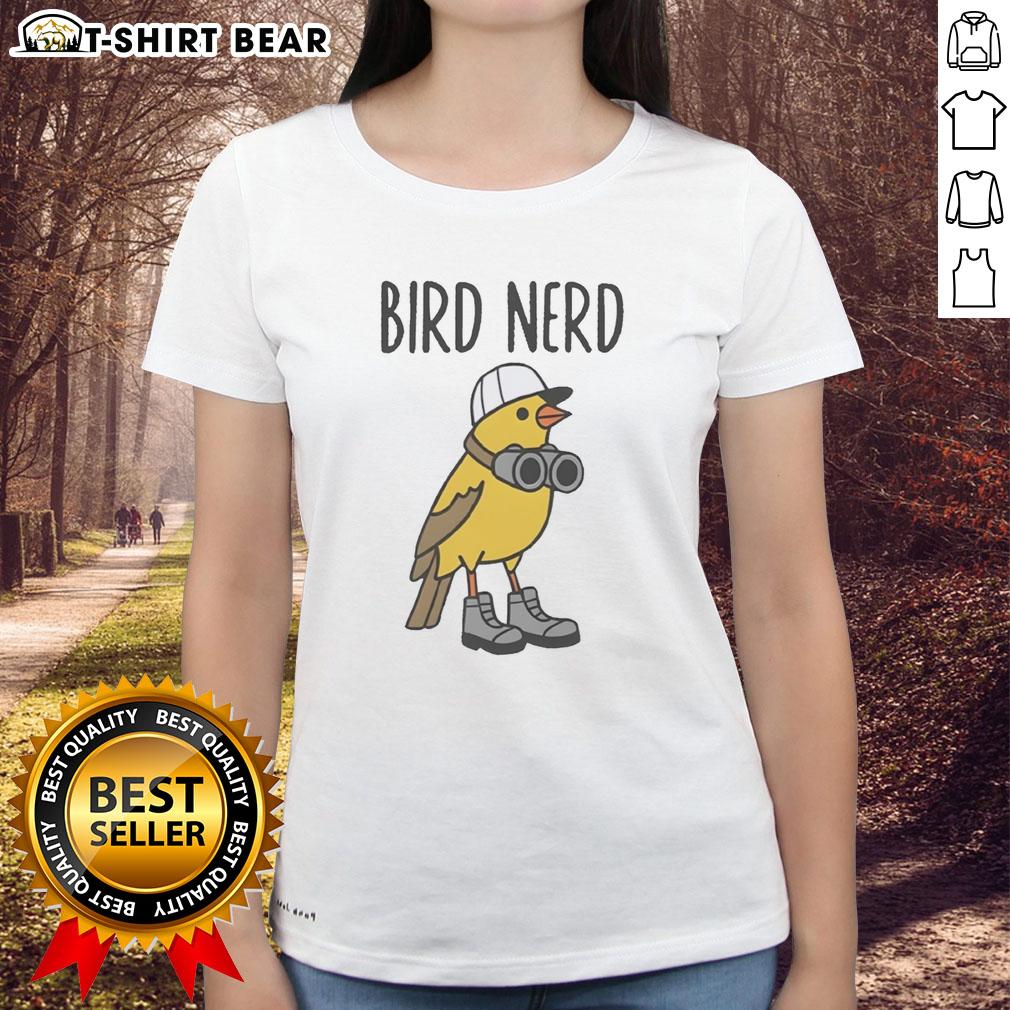 Nice brid nerd wearing shoes and binoculars, showcasing a trendy ladies tee perfect for casual outings.