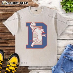 DePaul Blue Demons basketball mascot dunking in a washed t-shirt, showcasing team spirit and athletic energy.
