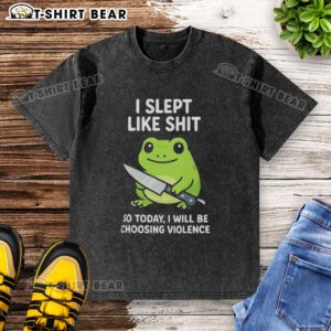 Cute grumpy tired frog choosing violence on a washed t-shirt design, perfect for quirky fashion lovers.