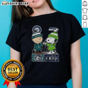 Nice Seattle Washington tee featuring Charlie Brown and Snoopy with Seattle Seahawks theme for ladies.