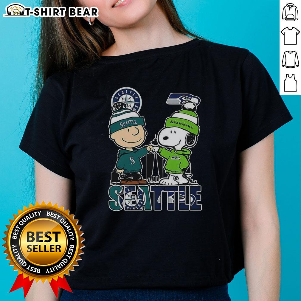 Nice Seattle Washington tee featuring Charlie Brown and Snoopy with Seattle Seahawks theme for ladies.