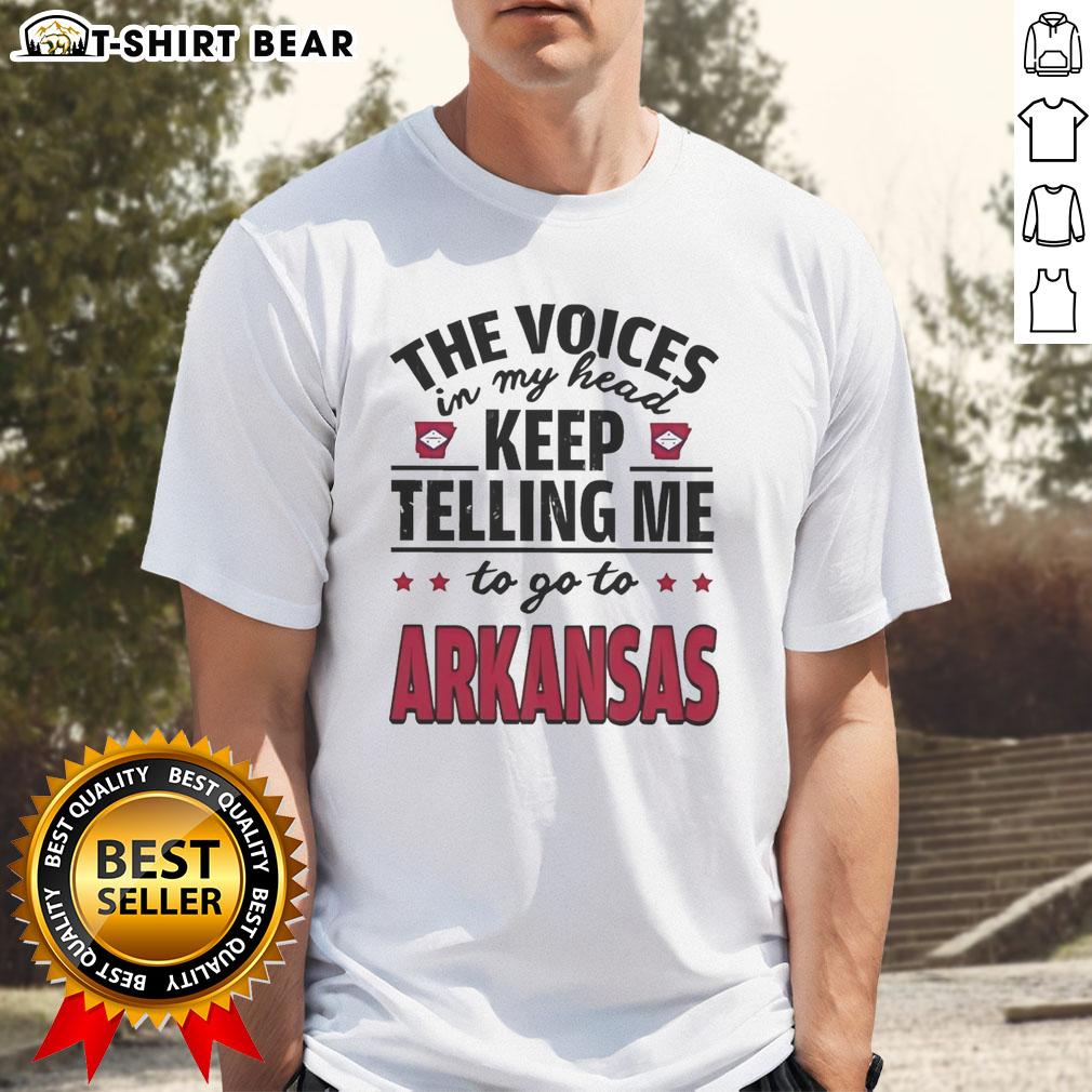 Alt Text: Official The Voices In My Head Keep Telling Me To Go To Arkansas T-Shirt featuring a humorous design for Arkansas fans.